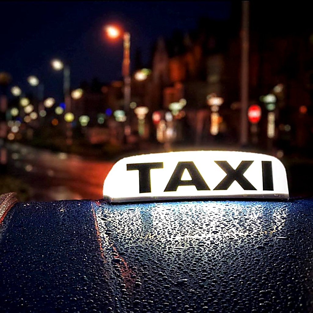 Premier Taxis licensed vehicles and professional drivers